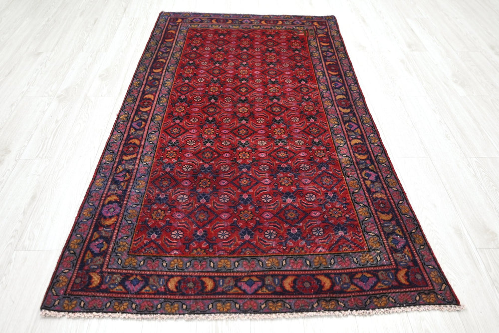 red Medium rug 3' 9" x 6' 10"