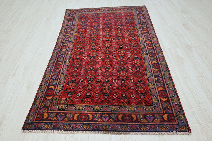 red Medium rug 3' 9" x 6' 10"
