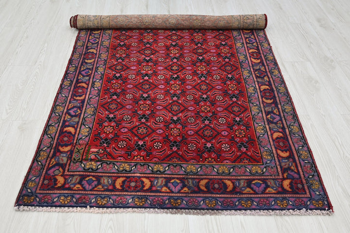 red Medium rug 3' 9" x 6' 10"