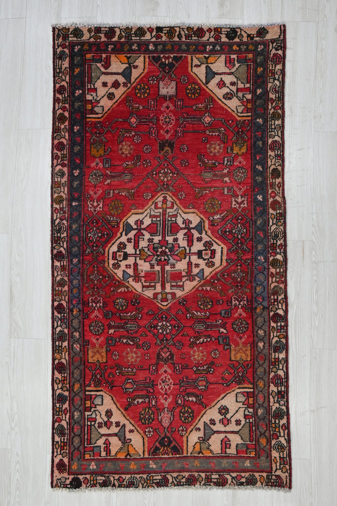 red Accent rug 3' 1" x 6' 3"