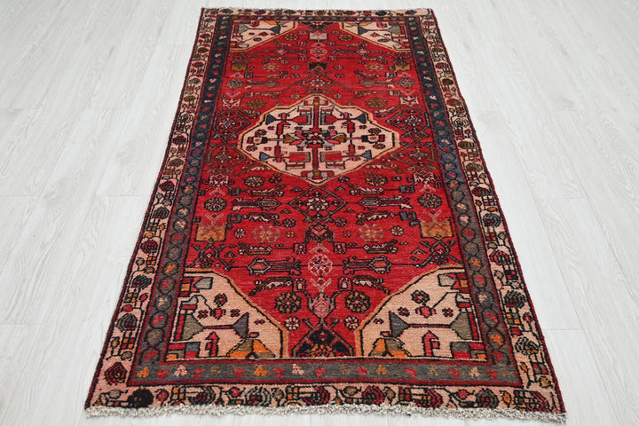 red Accent rug 3' 1" x 6' 3"