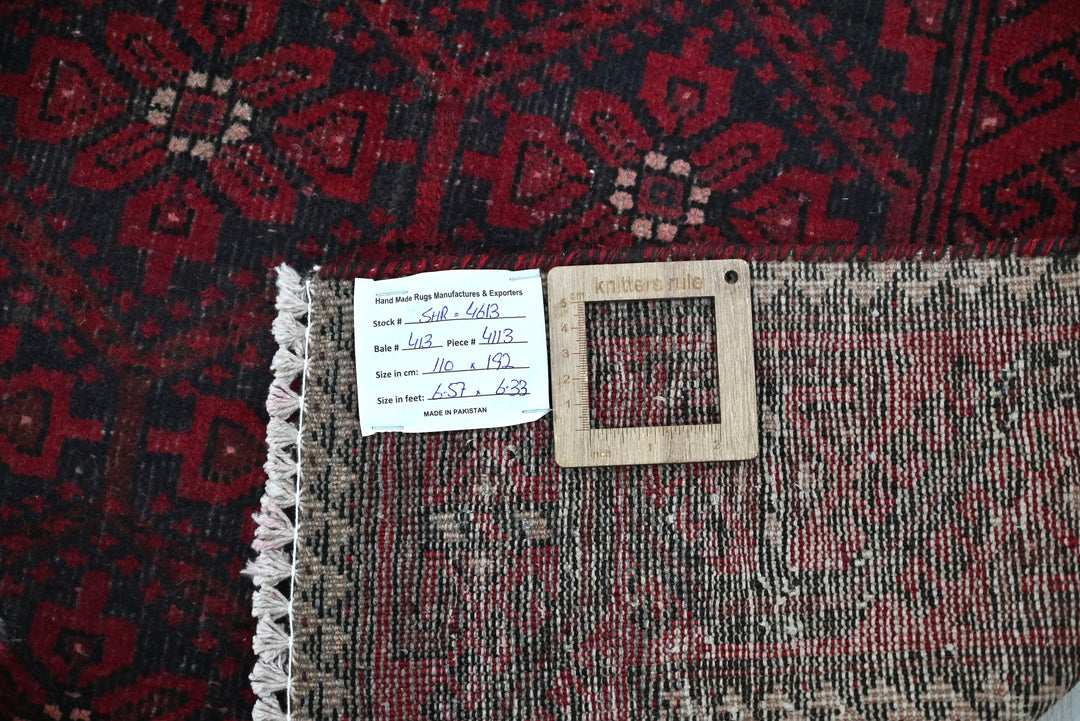 red Accent rug 3' 7" x 6' 4"