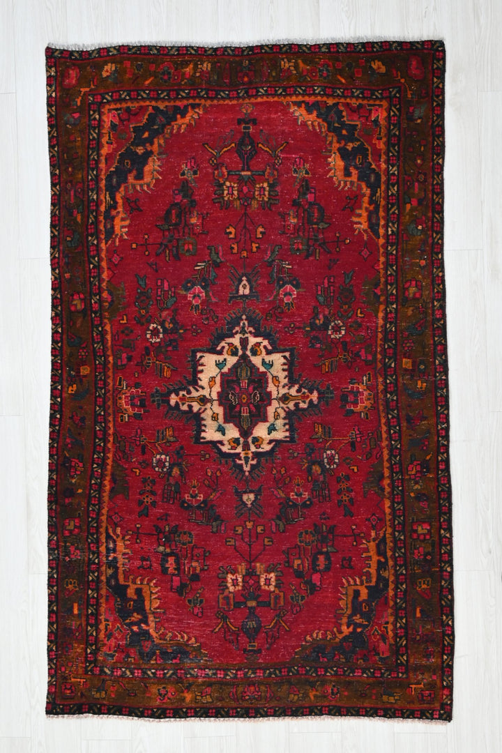 red Accent rug 3' 10" x 6' 3"
