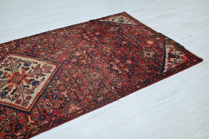 red Medium rug 3' 9" x 9' 2"