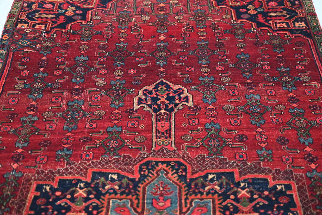 red Medium rug 3' 11" x 8' 9"