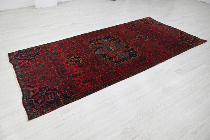 red Medium rug 3' 11" x 8' 9"