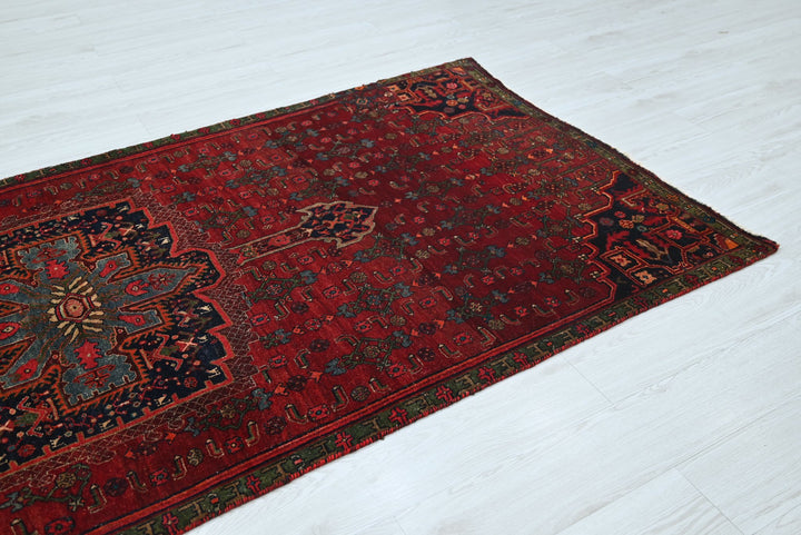 red Medium rug 3' 11" x 8' 9"