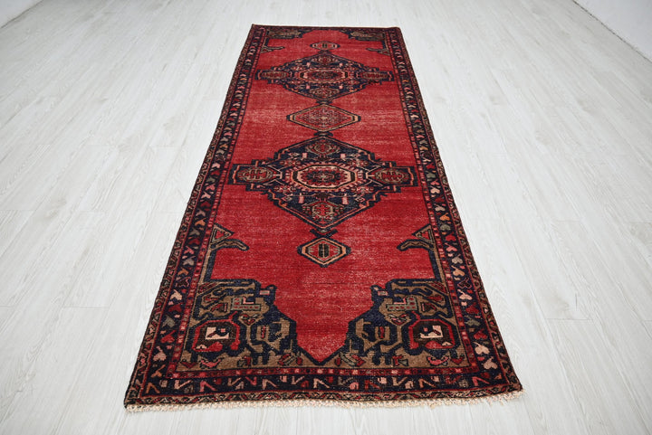 red Medium rug 3' 6" x 9' 0"