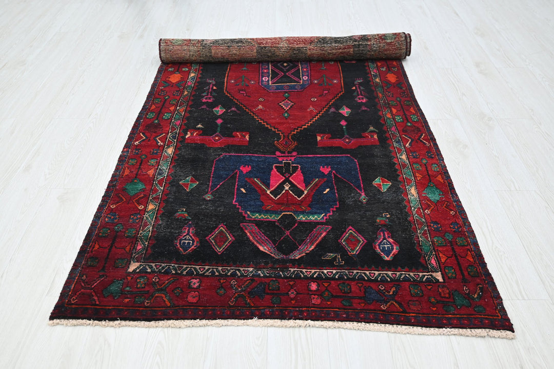 black Medium rug 3' 10" x 8' 4"