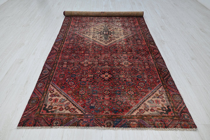 red Large rug 4' 10" x 10' 9"