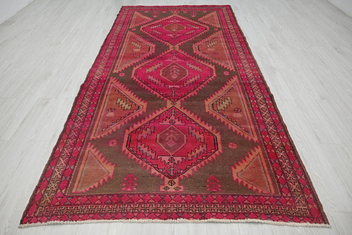 red Large rug 5' 0" x 10' 3"