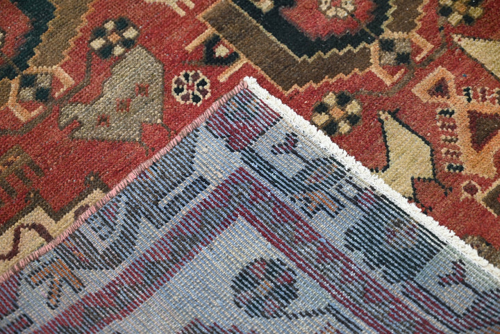 red Medium rug 4' 8" x 9' 3"