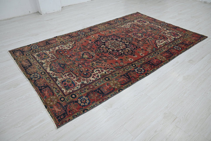 red Medium rug 5' 3" x 9' 1"