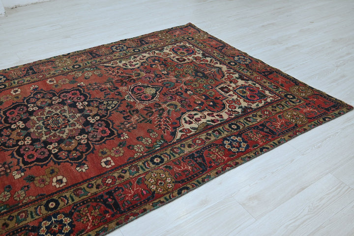 red Medium rug 5' 3" x 9' 1"