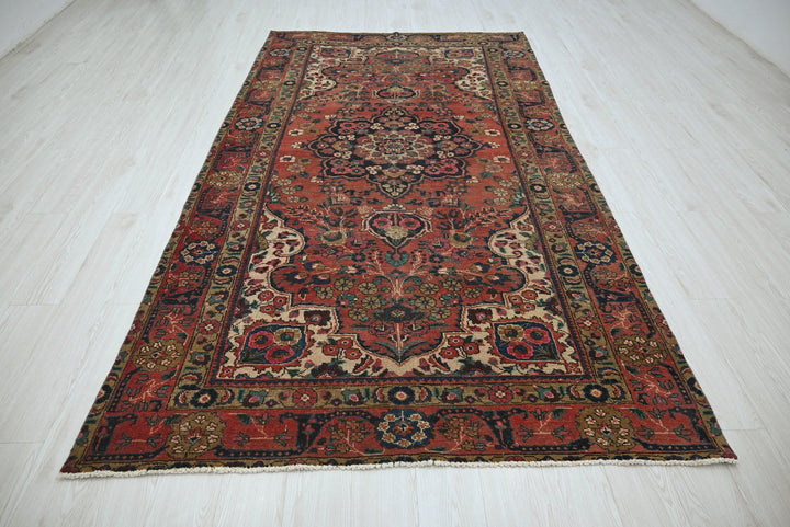 red Medium rug 5' 3" x 9' 1"