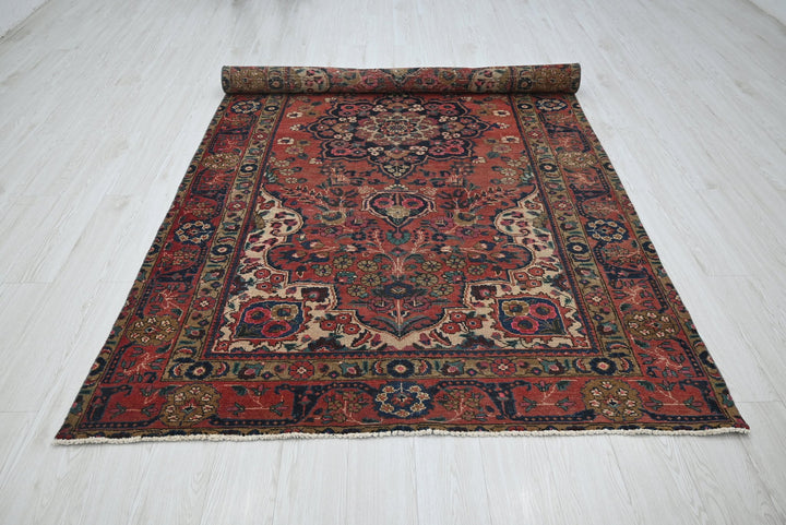 red Medium rug 5' 3" x 9' 1"