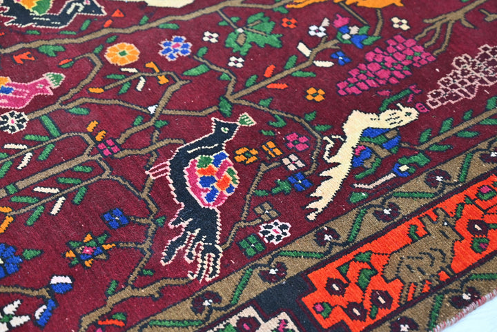 red Large rug 4' 8" x 9' 6"