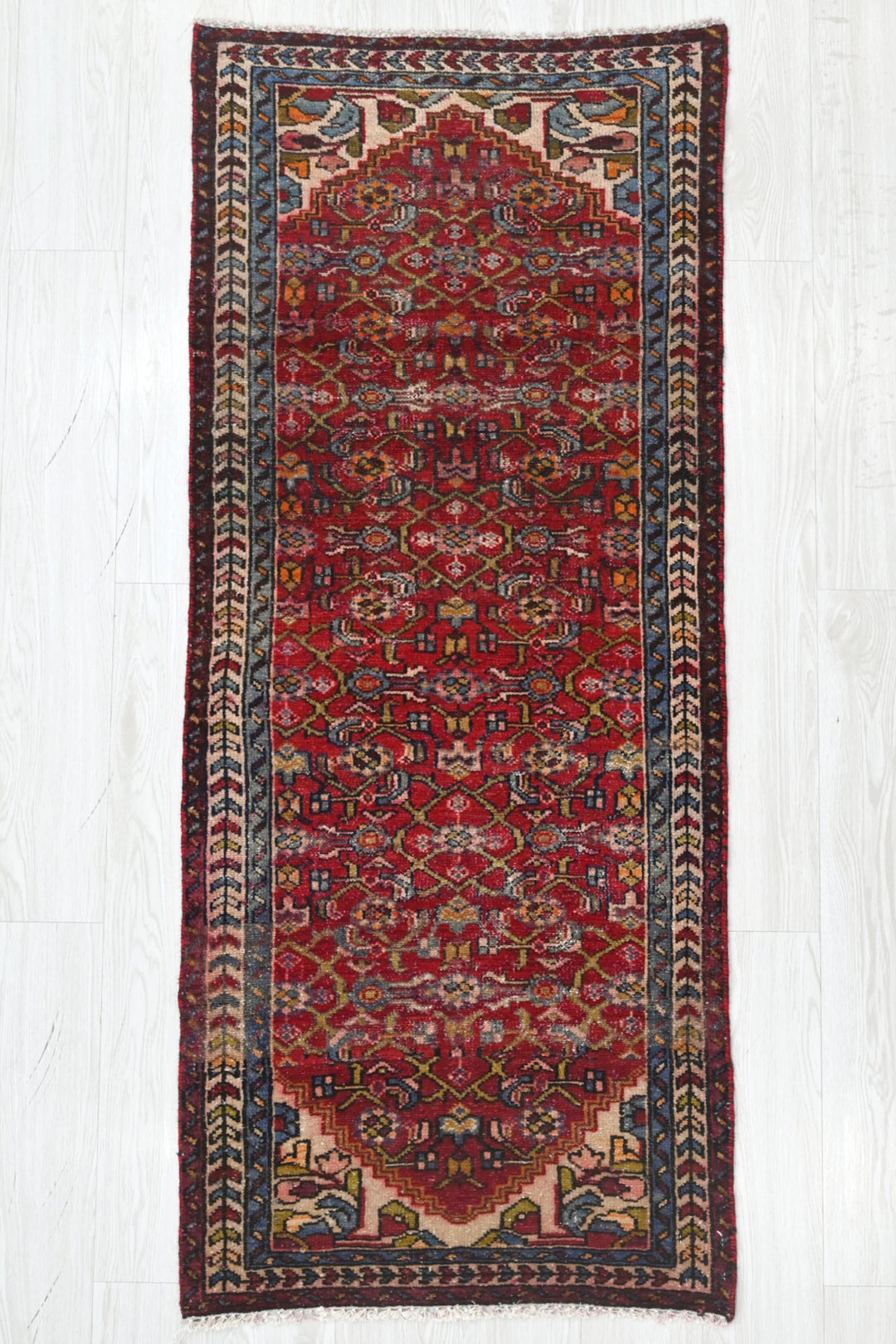 red Runner rug 2' 4" x 5' 7"