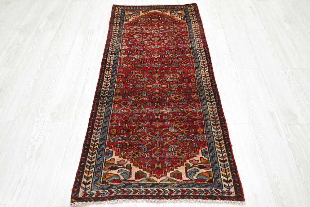 red Runner rug 2' 4" x 5' 7"