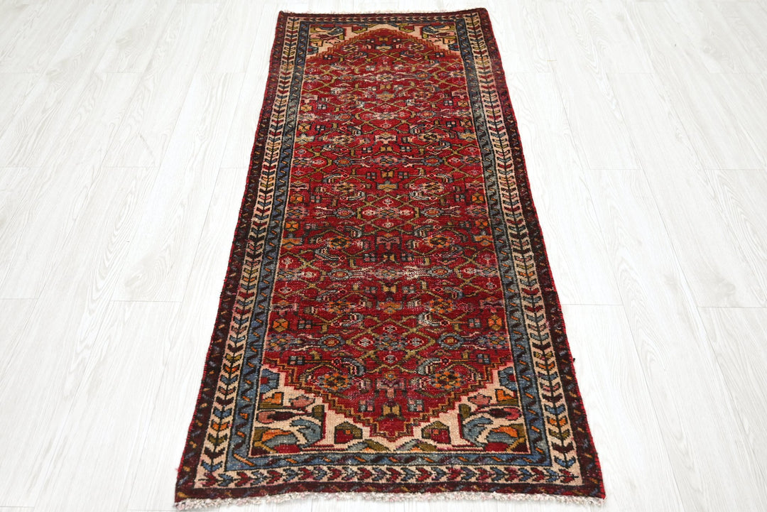 red Runner rug 2' 4" x 5' 7"