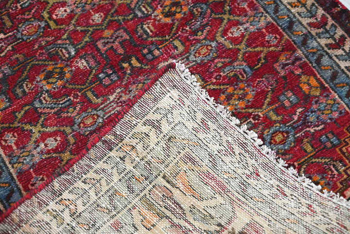 red Runner rug 2' 4" x 5' 7"