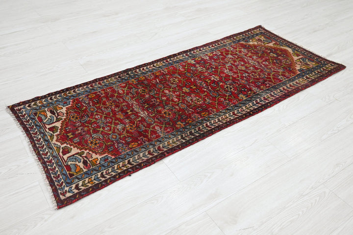 red Runner rug 2' 4" x 5' 7"