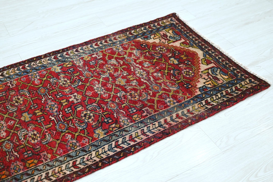 red Runner rug 2' 4" x 5' 7"