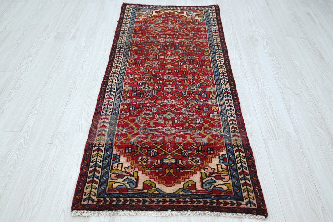 red Runner rug 2' 4" x 5' 7"