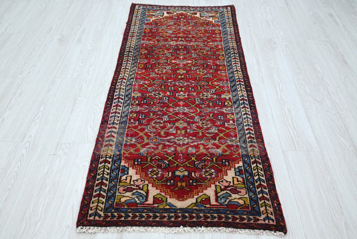 red Runner rug 2' 4" x 5' 7"