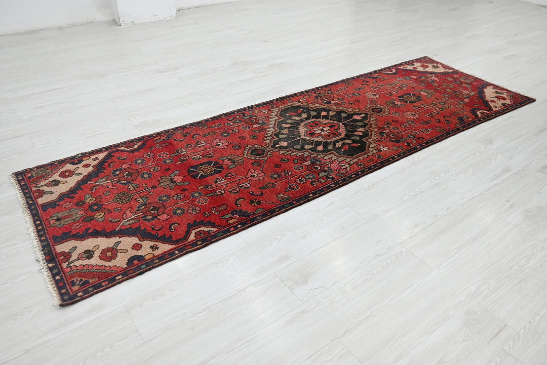 red Runner rug 2' 9" x 9' 0"