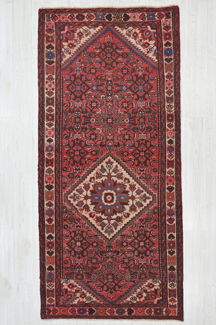 red Medium rug 3' 8" x 8' 2"