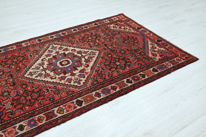 red Medium rug 3' 8" x 8' 2"