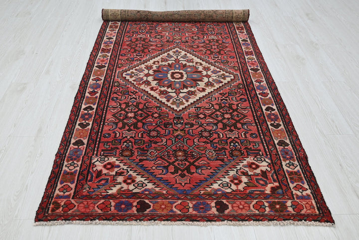 red Medium rug 3' 8" x 8' 2"