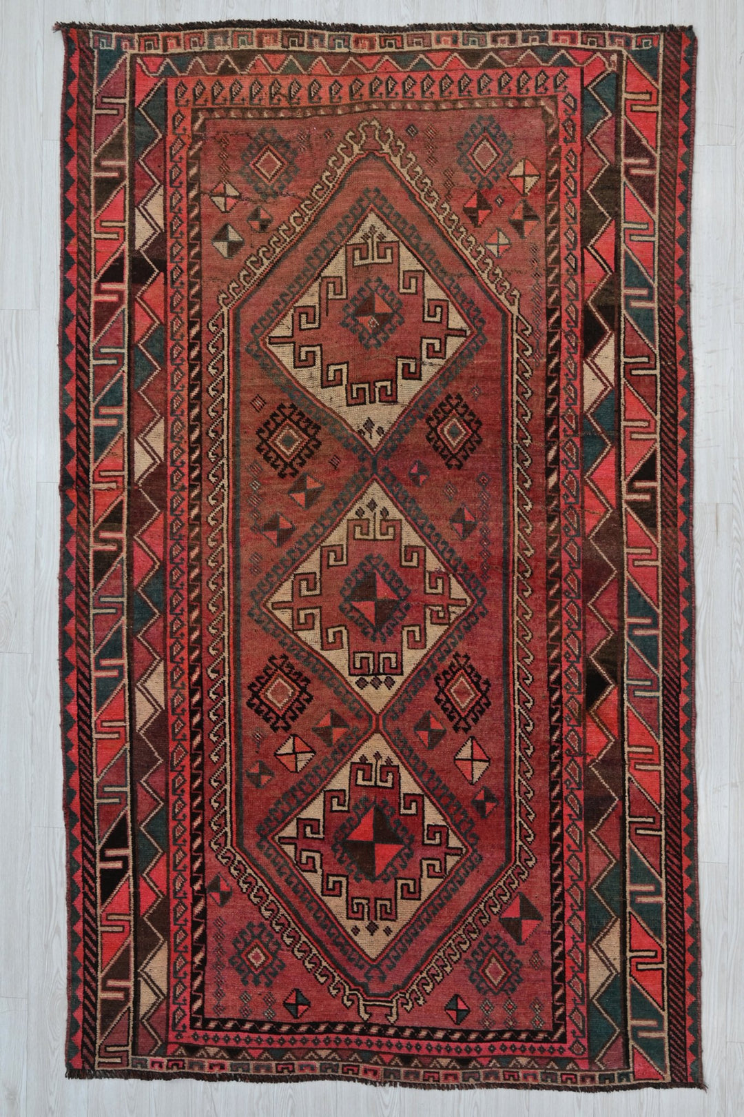 red Medium rug 5' 0" x 8' 11"
