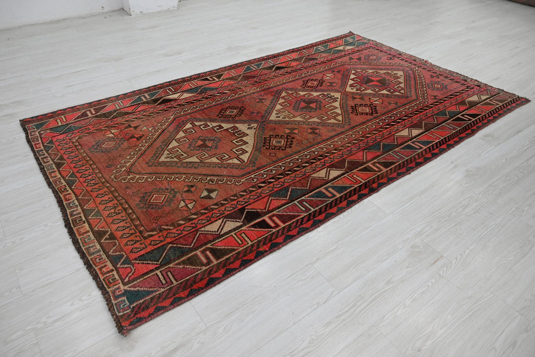 red Medium rug 5' 0" x 8' 11"