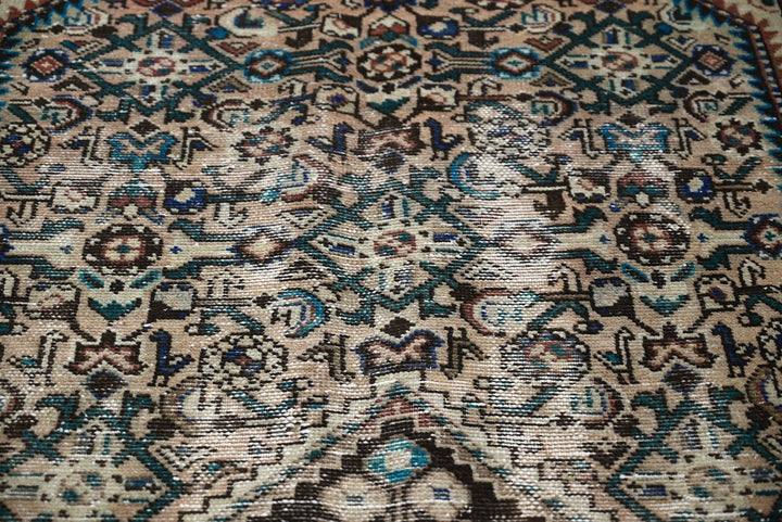 brown Large rug 5' 0" x 9' 8"