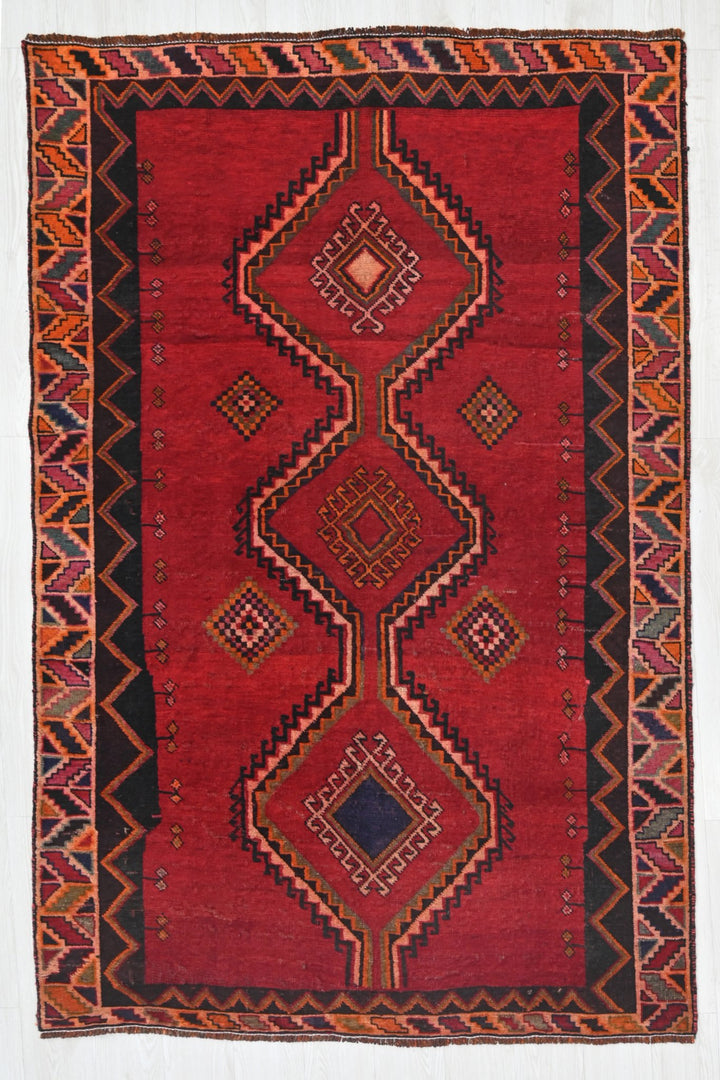 red Medium rug 4' 8" x 7' 9"
