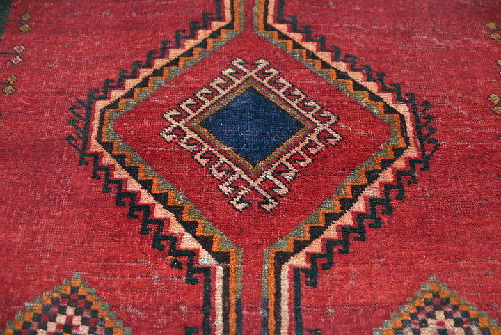 red Medium rug 4' 8" x 7' 9"