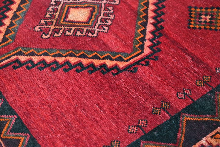 red Medium rug 4' 8" x 7' 9"