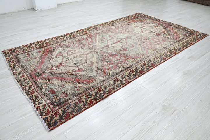brown Large rug 4' 9" x 9' 8"
