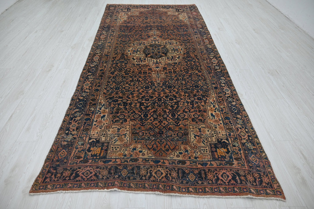 brown Large rug 4' 10" x 10' 6"