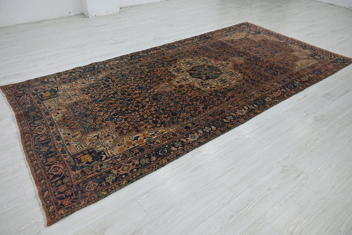brown Large rug 4' 10" x 10' 6"