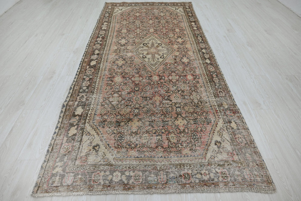 brown Large rug 4' 8" x 10' 4"
