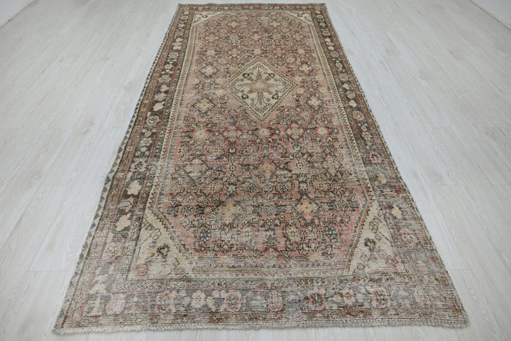 brown Large rug 4' 8" x 10' 4"