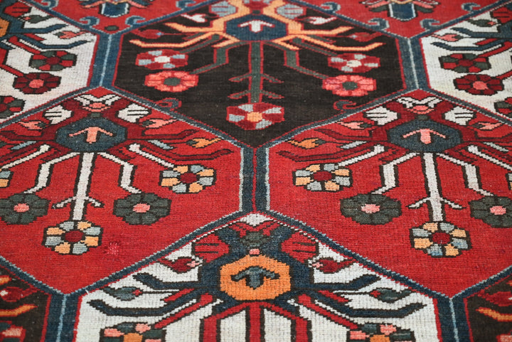 red Large rug 5' 4" x 9' 11"