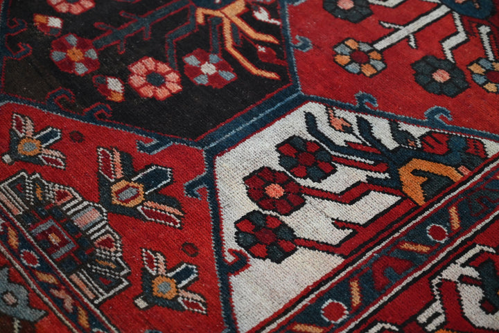 red Large rug 5' 4" x 9' 11"