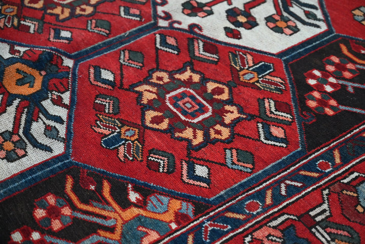 red Large rug 5' 4" x 9' 11"