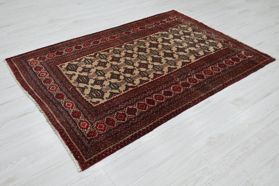 brown Accent rug 4' 0" x 5' 9"