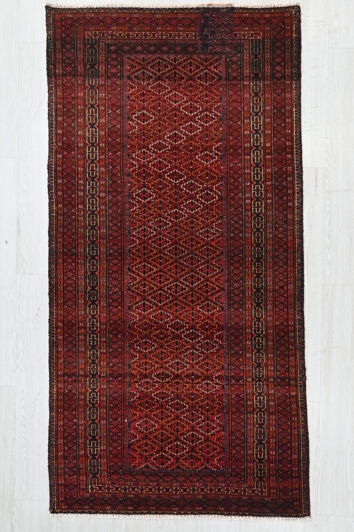 red Medium rug 3' 3" x 6' 7"