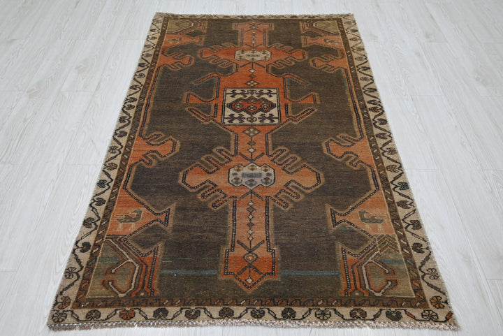 brown Accent rug 3' 7" x 5' 9"